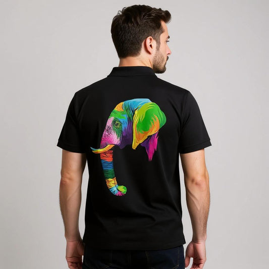Man wearing a black polo shirt with a colorful elephant design on the back against a gray background